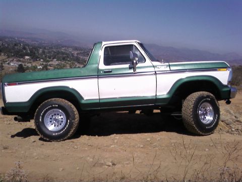 1978 Ford Bronco - This 1978 Ford Bronco, painted in a two-tone green and white scheme, sits lifted on BFGoodrich All-Terrain T/A tires.