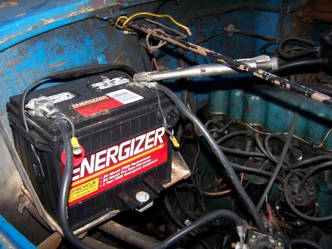 1976 Jeep CJ5 - Close-up of an Energizer battery and wiring in a vehicle's engine compartment.