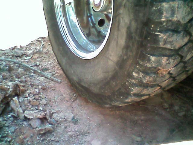 could fit my hand under the tire