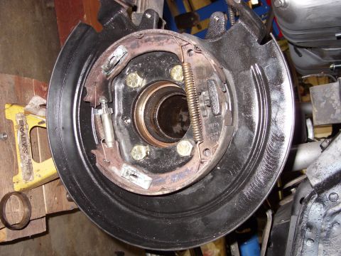 1978 Ford Mustang II - Close-up view of a drum brake assembly, showing the brake shoes, springs, and mounting hardware.