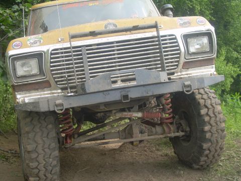 1978 Ford Bronco - This modified Ford truck features a prominent grille and off-road suspension, suggesting a model year around 1979.