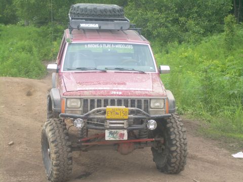 1978 Ford Bronco - This modified Jeep Cherokee XJ is equipped for off-road adventures with large tires and a roof-mounted spare.