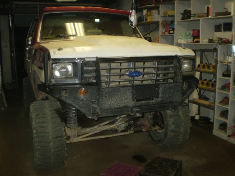1986 Ford Bronco - Front view of a 1986 Ford Bronco modified with a heavy-duty bumper and grille guard.