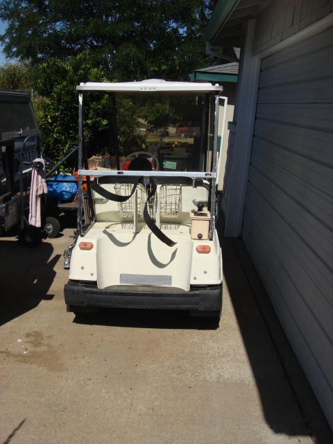 1983 Ford Bronco - here is the back of the cart. the ball washer and bag mount are coming off and a rear seat is going to replace it.