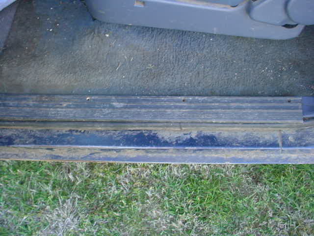 Interior door sill and carpet of a vehicle