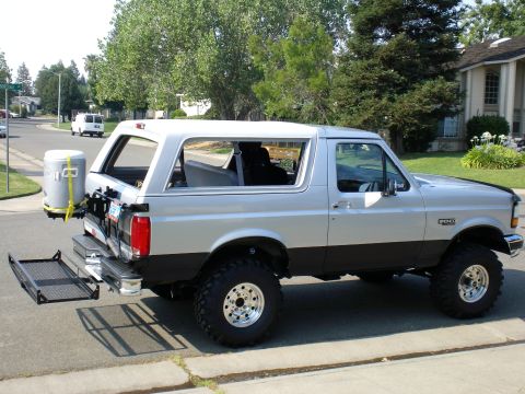 1996 Ford Bronco - Decided to put the top back on so the kids won't "Fry" on the camping trip but took out the windows so It feels like the tops off. Plus it…