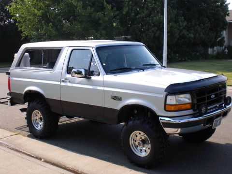 1996 Ford Bronco - Bumper trimmed & mounted some driving lights for the night trails. Just driving her around to break-in the new 456 gears so I can drain the…