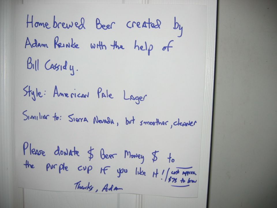 Handwritten sign describing homebrewed American Pale Lager beer with a donation request