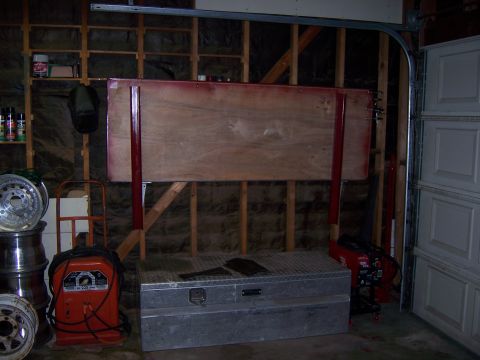 1991 Ford Bronco - A welding table is set up in a workshop, with tools and materials visible in the background.