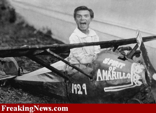 Man in cockpit of biplane labeled "Spirit of Amarillo" and "1929"