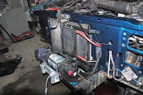 1996 Ford Bronco - Front end of a 1996 Ford Bronco showing the radiator and a newly installed winch.