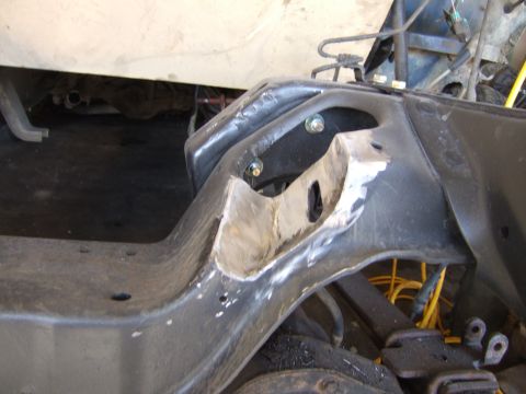1989 Ford Bronco - Modified vehicle frame showing custom metalwork and suspension components.
