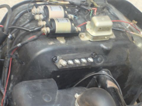 1983 Ford Bronco - I used a couple bolts and washers and lock washers to hold the tap in place.
