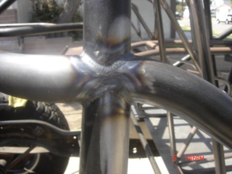 1995 Ford Bronco - Welded tubing structure, possibly part of a custom vehicle build.