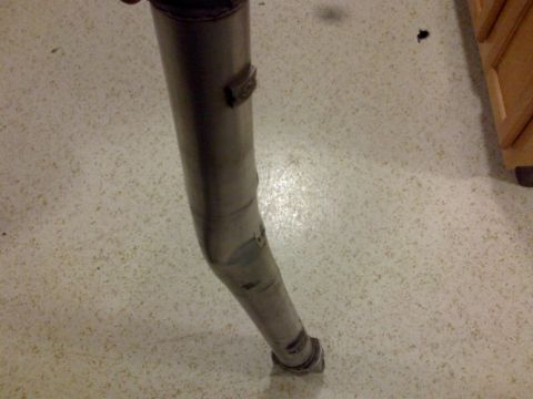 2002 Chevrolet Camaro - A damaged driveshaft is shown, with visible clamps and a dent.