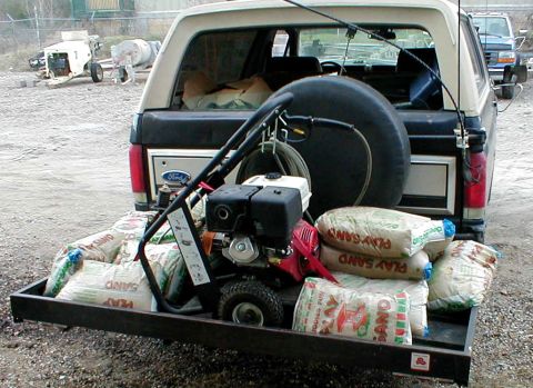 1983 Ford Bronco - I think it's about 800lb of cargo because each of the 13 sandbags weighs 50lb. The hitch hauler itself is another ~100 lb, so that's close…