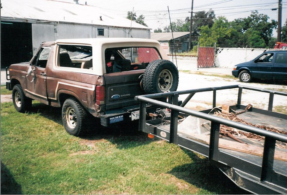 I continued all the way back onto my wheels, but I was still lined up with the upside-down trailer & car.  The 2 deputies who were the only other vehicles on the road couldn't believe it when I climbed out of the window.

There's still some grass caught between the LHR tire & rim.  That's how close it came to blowing off the rim when it dug in & laid over.