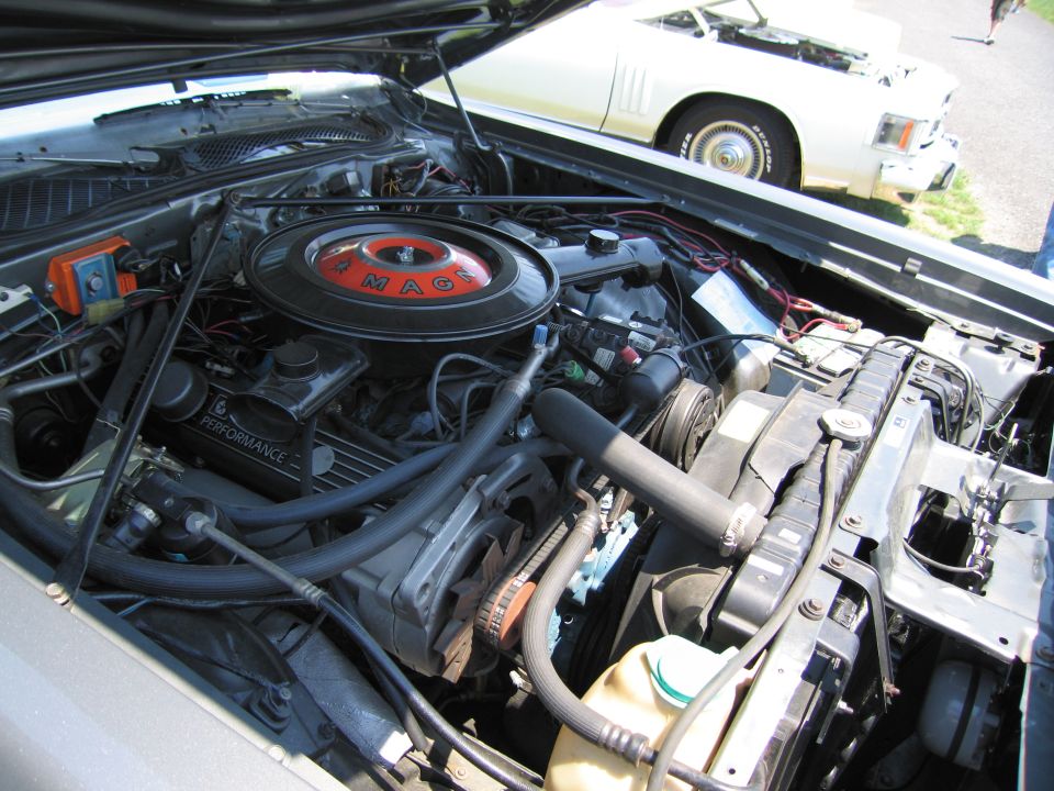 2001 Ford Crown Victoria engine bay with air intake and various components visible