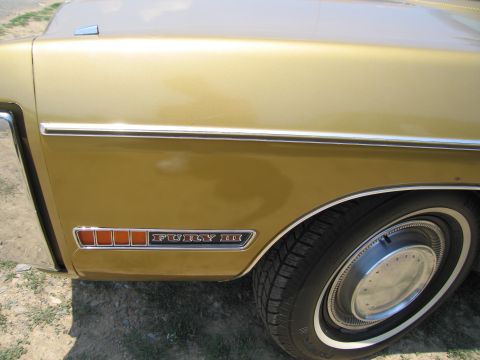 2001 Ford Crown Victoria - Photograph of a car body detail, not a technical document.