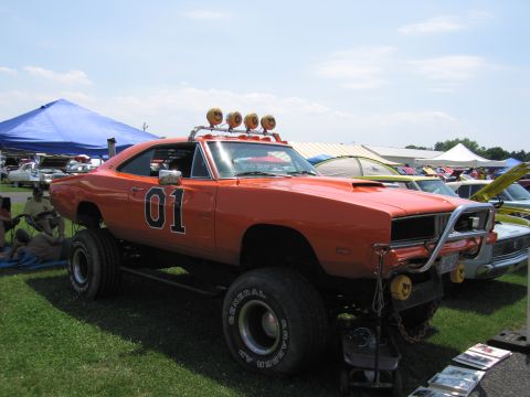 2001 Ford Crown Victoria - This modified 1969 Dodge Charger, known as the General Lee, is on display at an outdoor event.