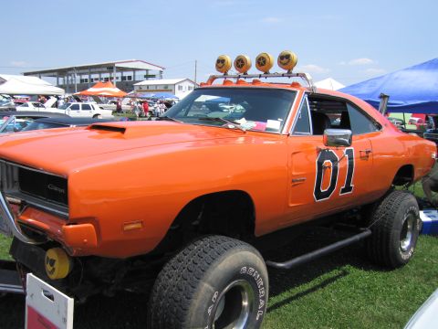 2001 Ford Crown Victoria - This modified 1969 Dodge Charger, famously known as the "General Lee", features a lifted suspension and "01" graphics.