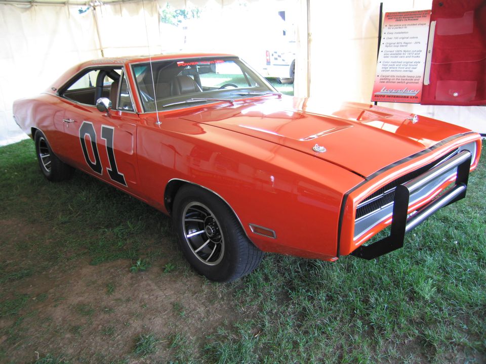 Orange 1969 Dodge Charger with "01" on doors and push bumper