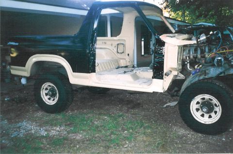 1983 Ford Bronco - At the lower corner of the firewall, you can see the rubber cowl drain valve for the A/C fresh air intake.