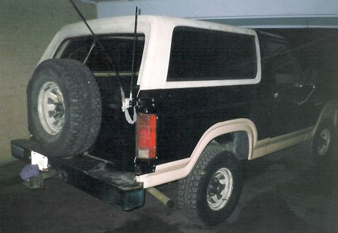 1983 Ford Bronco - The door is aligned, but the painter didn't get the black of the body right. This was ~5 years ago, and I still haven't fixed it.