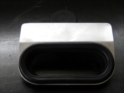 1996 Ford Bronco - A close-up view of a metal part with black rubber trim, likely an aftermarket upgrade.