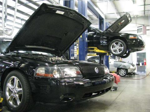 2003 Mercury Marauder - #4#'s Marauder in the foreground and mine on the lift.
