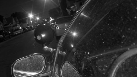 2000 Ford Crown Victoria - A dimly lit interior view of a vehicle's ceiling lights.