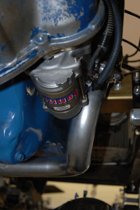 1975 Jeep CJ5 - Close-up of a Summit Racing starter motor, part of an engine assembly.