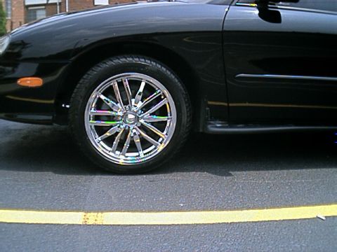 2000 Ford Taurus - Here is a good pic of my wheels. they are a little harder to keep clean than I expected, but when they're rollin, its all worth it.