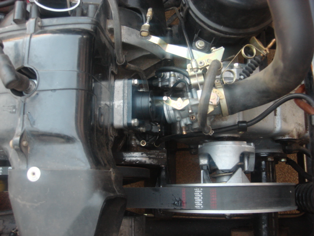 you put the gasket then the reed valve then the intake boot and the carb and tighen all down. re-install the hose clamp and carb and go road test. this thing is working great..