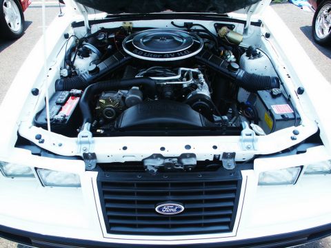 2001 Mercury Grand Marquis - Engine bay view of a Ford 5.0 Liter 4V HO engine, showing air intake and battery.