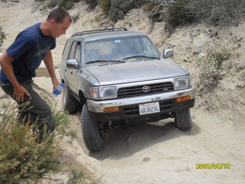 1990 Ford Bronco - Toyota 4Runner navigating a rough off-road trail on Cleghorn Rd.