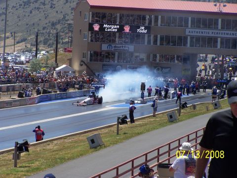 1972 Ford Ranchero - A dragster launches down the track, kicking up smoke at Bandimere Speedway on July 13, 2008.