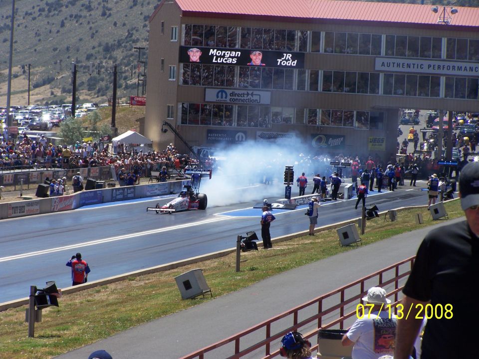 Dragster launching with smoke, Bandimere Speedway
