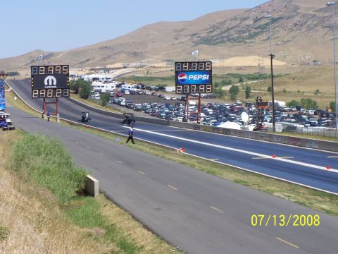 1972 Ford Ranchero - Bandimere Speedway scene on July 13, 2008, showing the drag strip, scoreboards, and spectator parking.