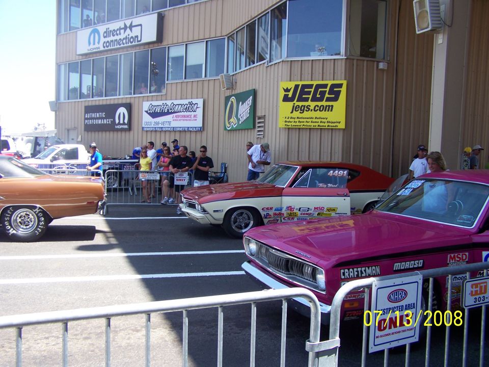 Pink drag car with Craftsman and Moroso decals, front view