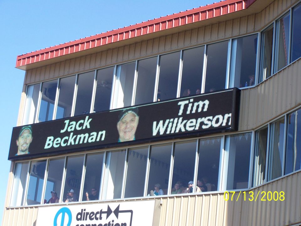 Digital sign displays Jack Beckman and Tim Wilkerson with their photos. Date stamp reads 07/13/2008