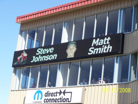 1972 Ford Ranchero - A digital display shows names and photos of Steve Johnson and Matt Smith, with a Mopar Direct Connection logo below.
