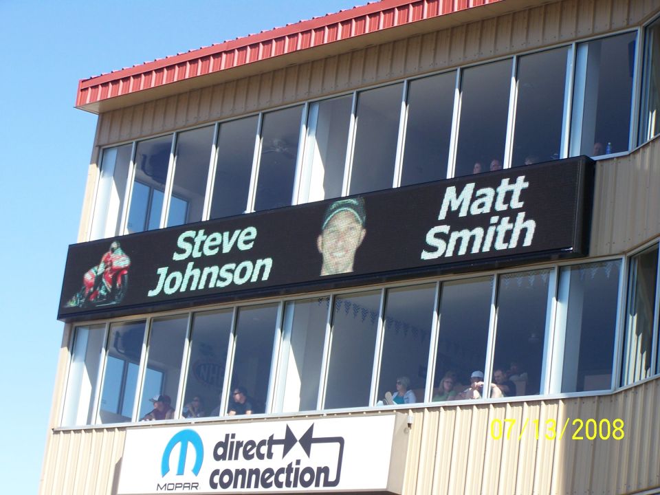 Digital display with names Steve Johnson and Matt Smith, and a Mopar Direct Connection logo