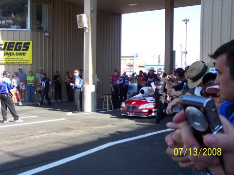 1972 Ford Ranchero - A red drag car with a prominent intake and GXP lettering is prepared for an event on 07/13/2008.