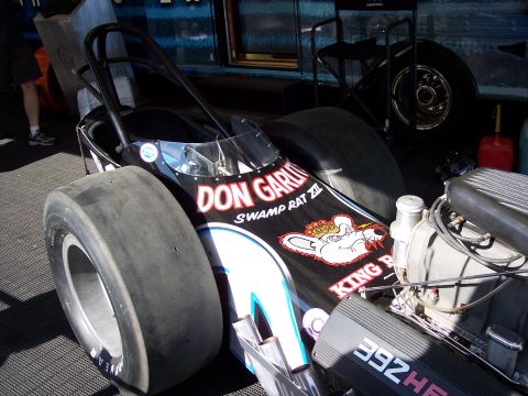 1972 Ford Ranchero - A dragster, identified as "Swamp Rat XI" and a "392 Hemi" engine, is shown from the front.