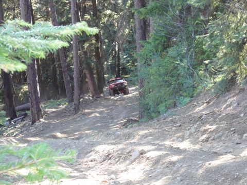 1991 Ford Bronco - John on the hill climb, no that is not a winch cable. Looks like a stick in the foreground.