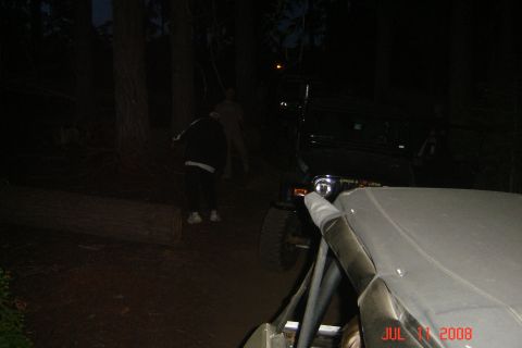 1978 Ford Bronco - A dark scene shows a black SUV parked in a wooded area at night, with a timestamp indicating July 11, 2008.