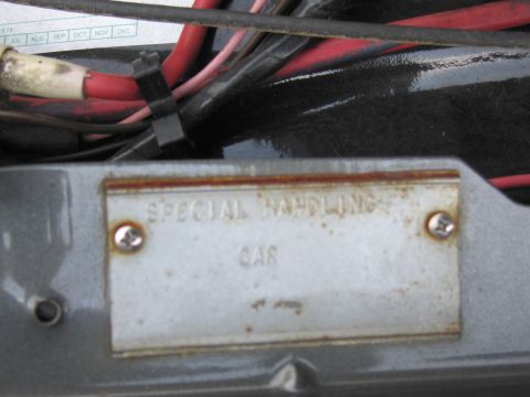2001 Ford Crown Victoria - Close-up of a 'Special Handling Car' identification plate, with visible wiring in the background.