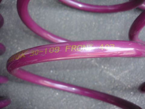 1993 Ford Taurus - Purple coil springs with part number and 'FRONT' designation visible.