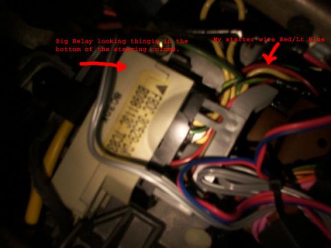 1998 Ford Taurus - Wiring harness and relay located at the bottom of the steering column.